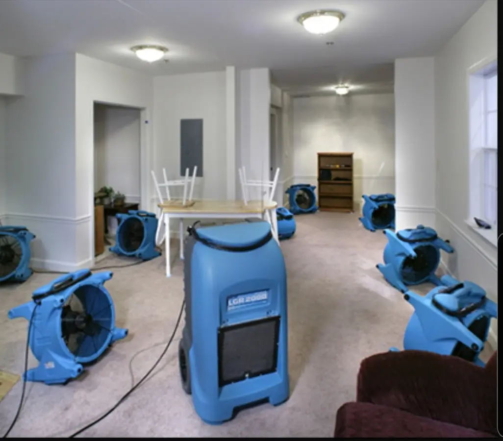Air movers and dehumidifier setup for Water Damage Restoration in Minnehaha